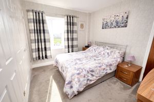 Bedroom One- click for photo gallery